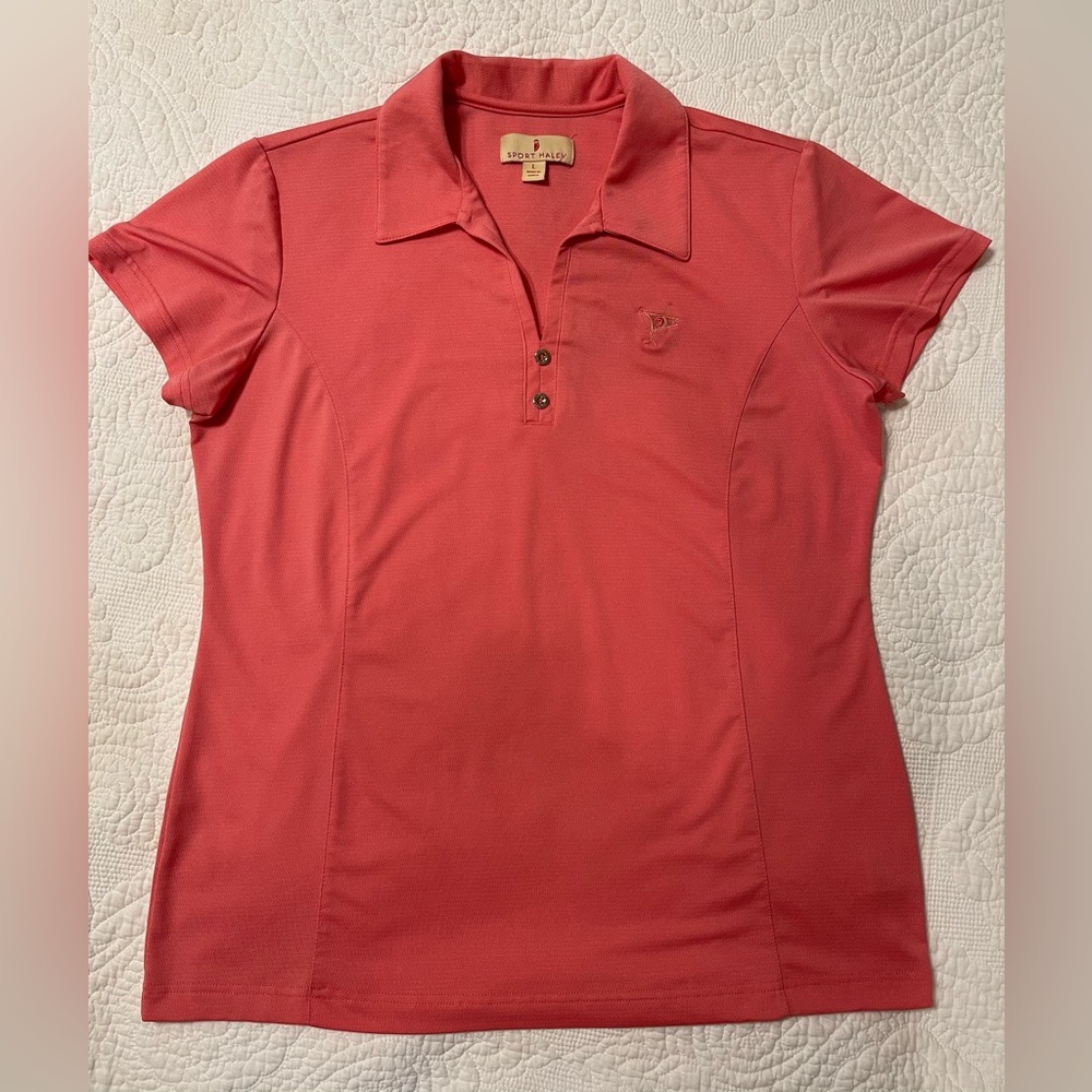 Polo shirt by Sport Haley. Short sleeve. Light orange. Size L